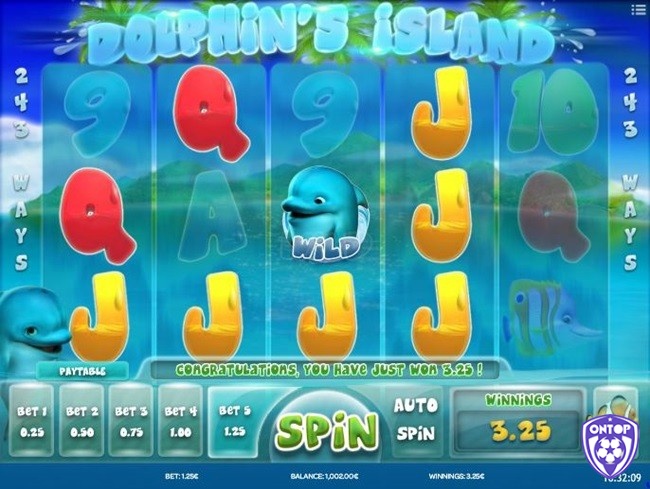 Nhấn Spin màu xanh ở giữa bảng điều khiển để bắt đầu quay Dolphin's Island